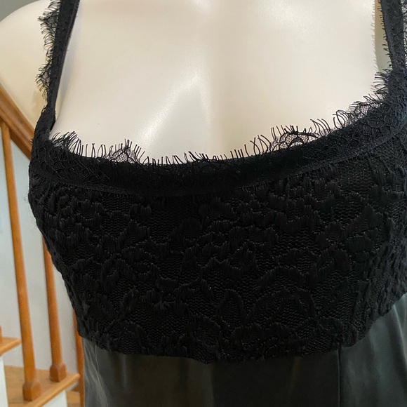 Black form fitting, sexy.  Lacy top and bottom.  Leather look. - Picture 3 of 4